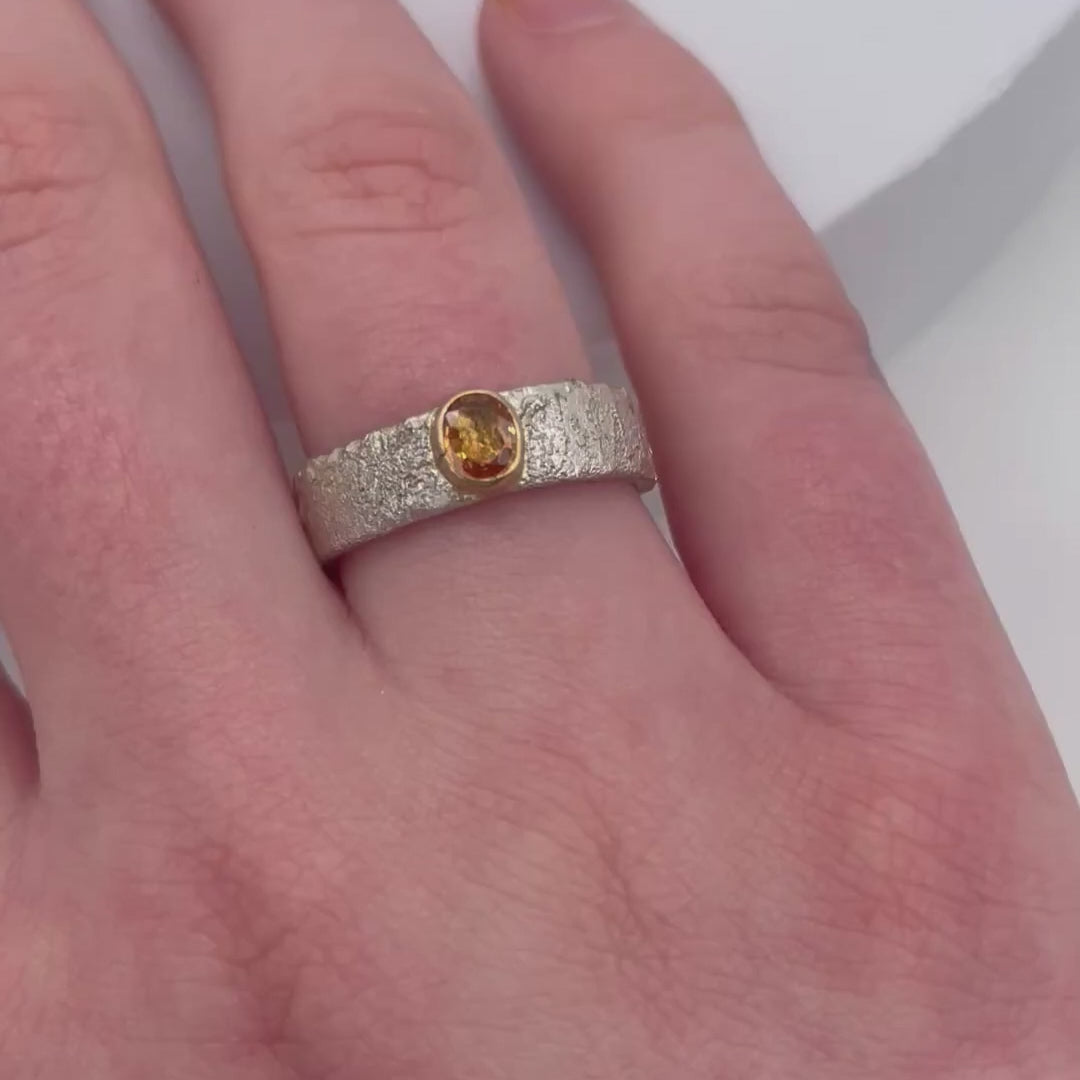 Rivda yellow sapphire ring worn on hand showing organic texture and stone brilliance