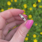 Rivda blue sapphire ring in sterling silver with 9ct gold setting - natural light in the garden