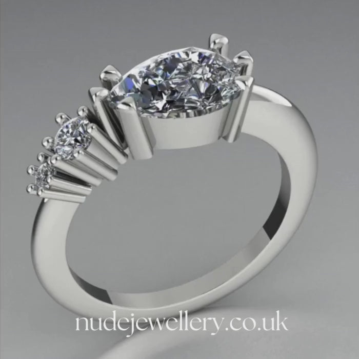Comet Ring: Pear Shaped Lab Grown Diamonds Horizontally Set Trilogy Ring