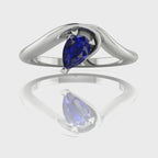 Enchanted Pear Shaped Blue Sapphire Asymmetrical Solitaire Engagement Ring in Platinum or 18ct White Gold