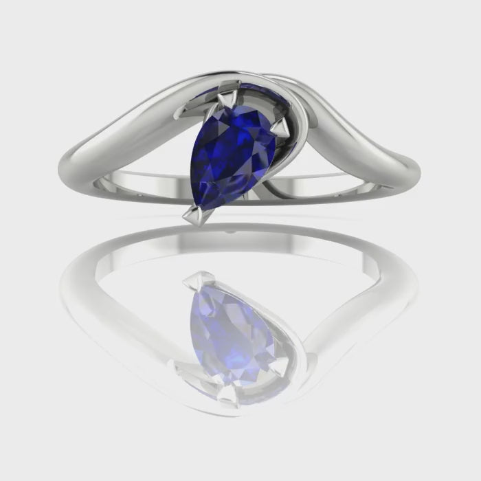 Enchanted Pear Shaped Blue Sapphire Asymmetrical Solitaire Engagement Ring in Platinum or 18ct White Gold