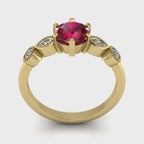 Movie view of the Milena engagement ring showing the vivid ruby centre stone and four diamond side stones in 18ct yellow gold