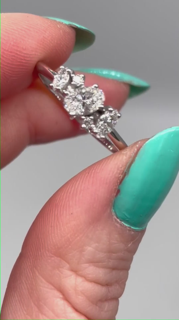 Atlantis diamond asymmetrical engagement ring in platinum or 18ct white gold, rotating 360° studio video showing the organic diamond cluster and sculptural setting, handmade in our London studio