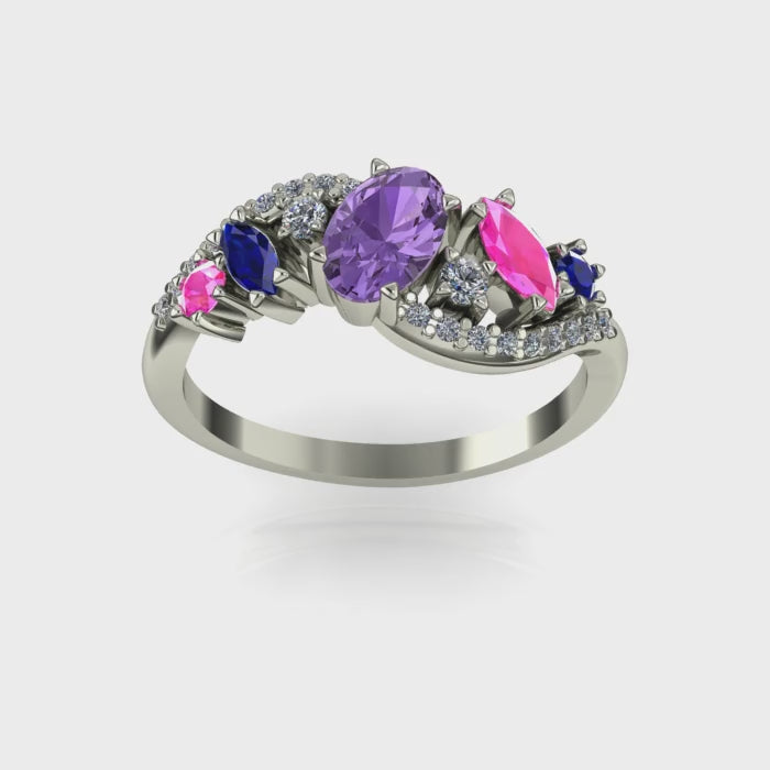 Video of the Atlantis Storm ring in 18ct white gold, showing the light dancing through violet, blue, and pink sapphires and white diamonds.
