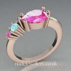 Comet Ring: Pear Shaped Pink Sapphire's & Aquamarine Rose Gold Trilogy Ring