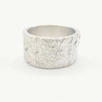 Rivda Frozen Sand 10mm wide textured sterling silver band, handmade in London by Nude Jewellery