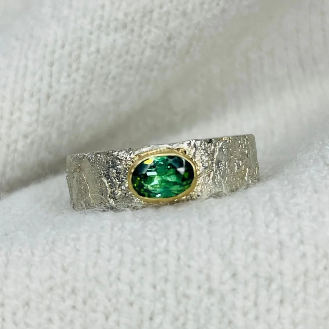 Rivda oval vivid green tourmaline ring handmade from sterling silver with 9ct gold setting 