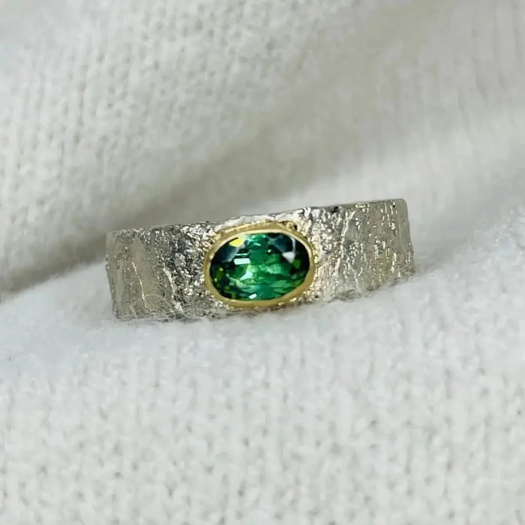 Rivda oval vivid green tourmaline ring handmade from sterling silver with 9ct gold setting 