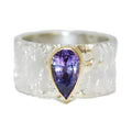 Rivda pear-shaped purple sapphire ring in sterling silver with 9ct gold setting — front view