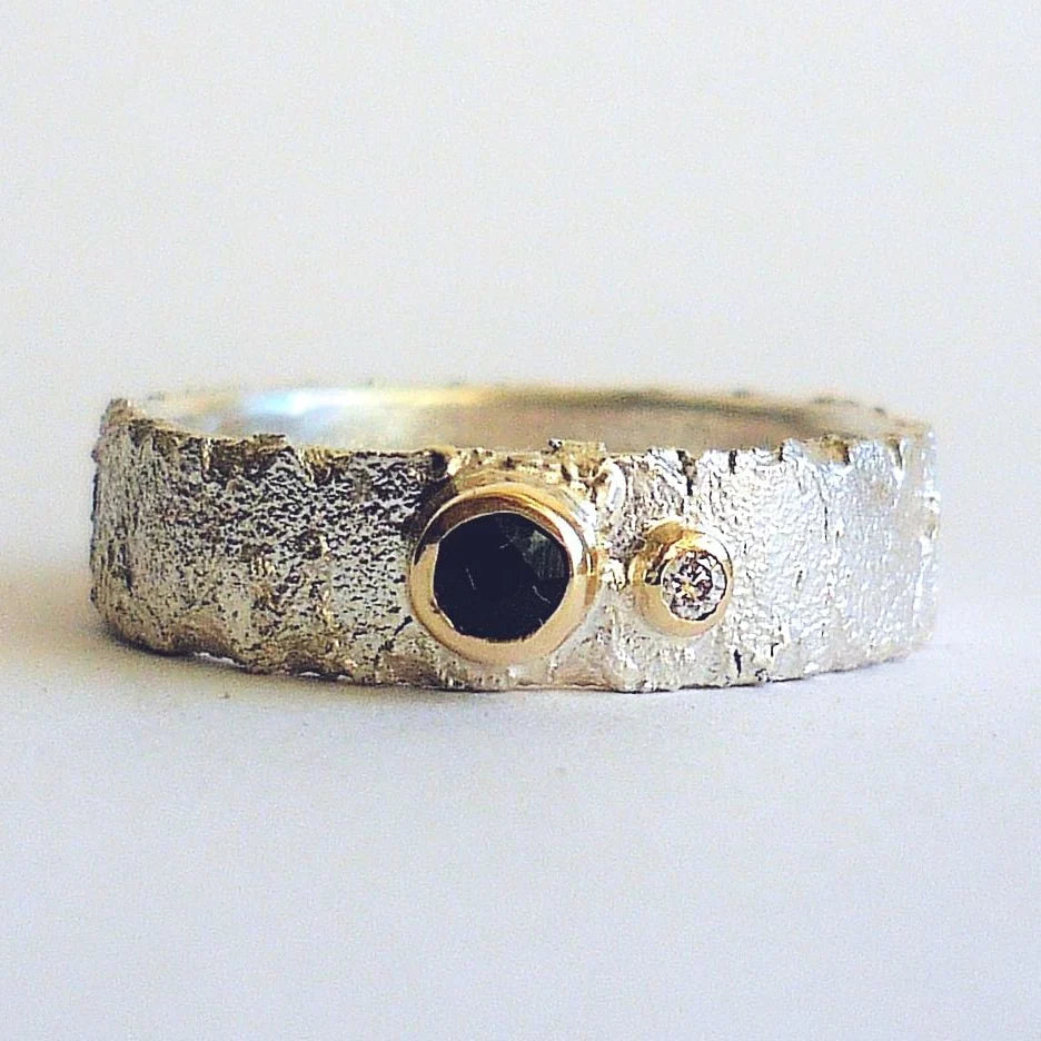Rivda sapphire and diamond ring in sterling silver with 9ct gold settings — front view