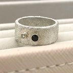 silver rivda sapphire and diamond wide band engagement ring