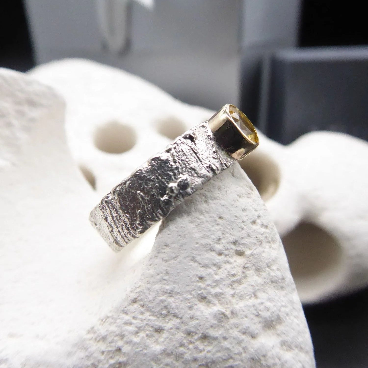  Rivda oval yellow sapphire ring — side view showing band profile and Rivda texture