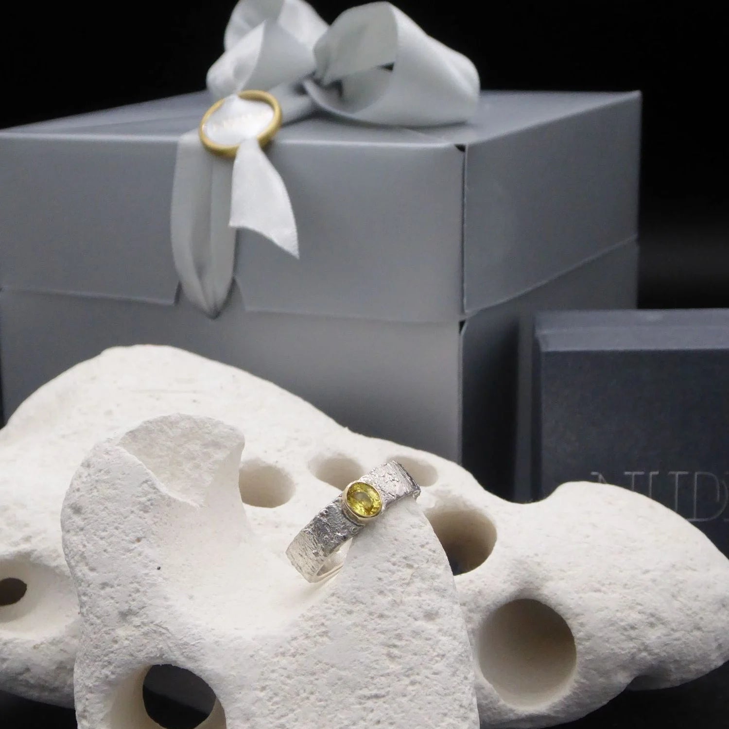 Rivda yellow sapphire ring presented in luxury Nude Jewellery gift box