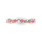 Top-down studio hero shot of the alternative eternity ring, showcasing the unique linked rose gold bubble design set with mixed precious gemstones.