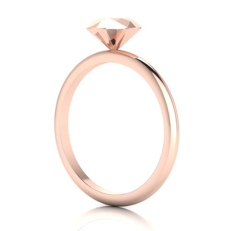 Side profile of the Viva rose gold rock ring showing the height and elevation of the textured solitaire setting.