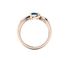 Enchanted Pear Shaped London Blue Topaz Asymmetrical Solitaire Engagement Ring in 18ct Rose Gold
