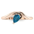 Enchanted Pear Shaped London Blue Topaz Asymmetrical Solitaire Engagement Ring in 18ct Rose Gold