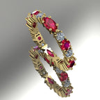 Handmade Allsorts eternity ring in 18ct yellow gold, featuring a striking and edgy arrangement of vivid red rubies and brilliant-cut white diamonds.
