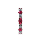 Side profile of the Allsorts eternity ring, highlighting the contemporary architectural details and the secure white gold claws holding each ruby and diamond.