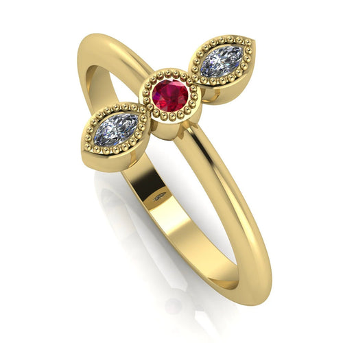 Angled view of an 18ct yellow gold trilogy ring with a ruby and diamonds featuring fine milgrain textured edges.