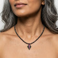 Art Deco silver ruby and hematite geometric pendant necklace worn on model showing length and scale