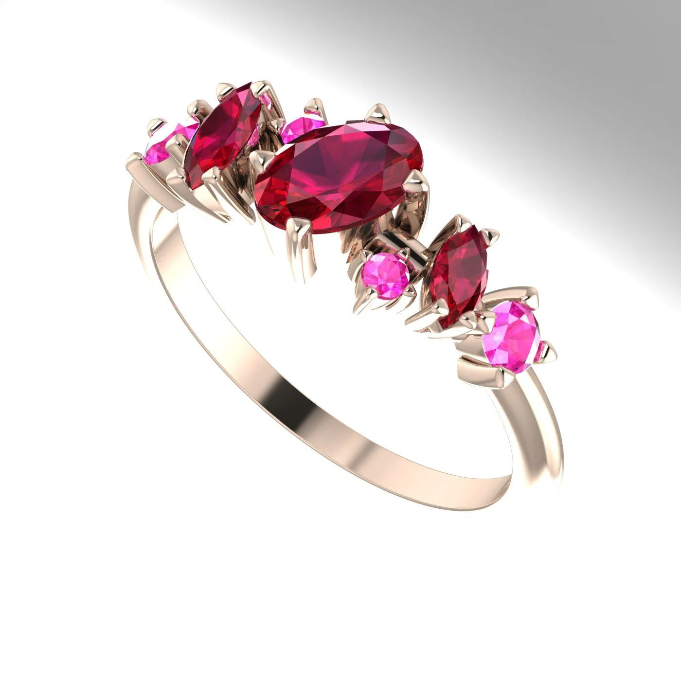 An angled view of the Atlantis Paradise ring highlighting the three-dimensional cluster of red and pink gemstones.