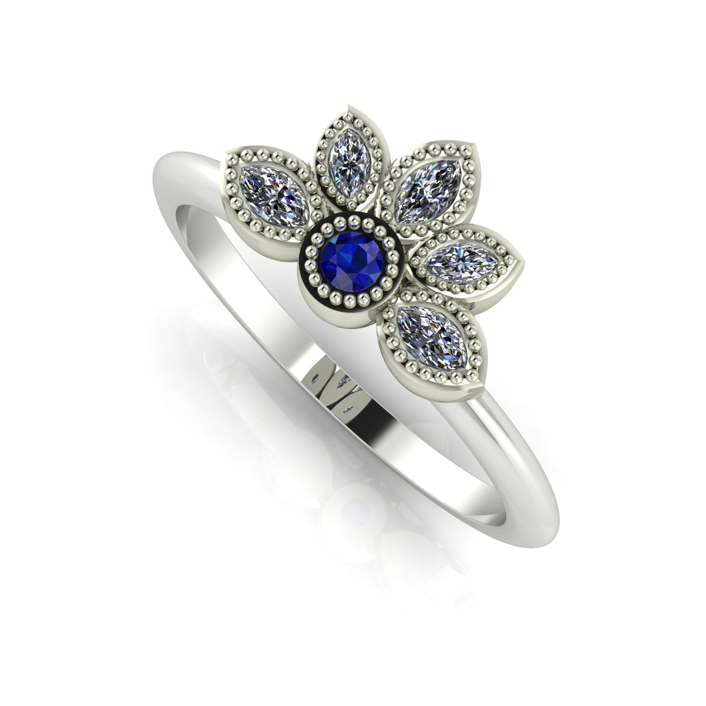 Angled view of a sapphire and marquise diamond cluster ring in a white gold or platinum setting with beaded details.