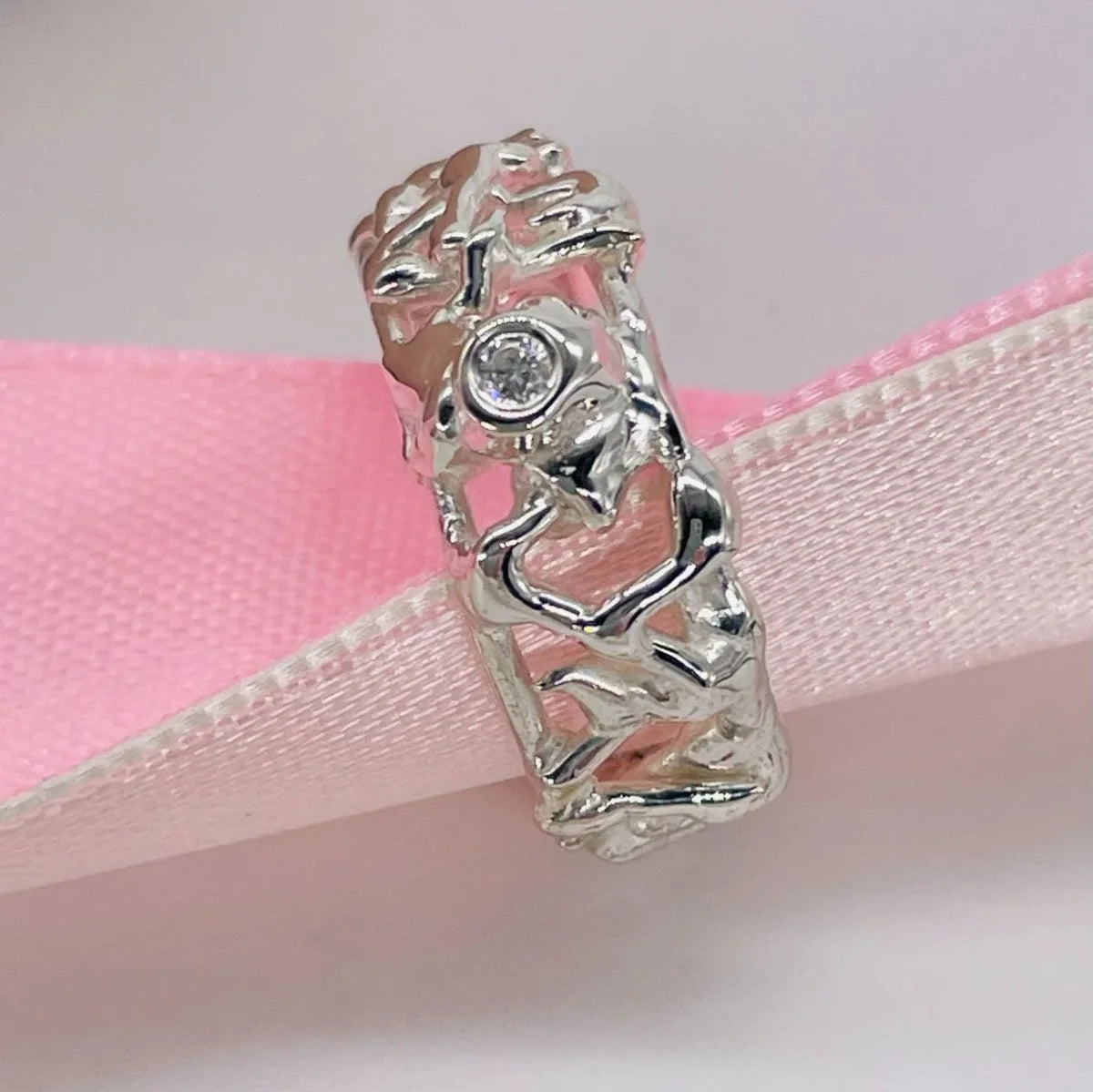 Sculptural Origin Honeycomb Ring in sterling silver set with a brilliant-cut diamond
