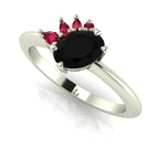 Selene black diamond and ruby engagement ring in white gold three-quarter view showing ruby crown cluster detail
