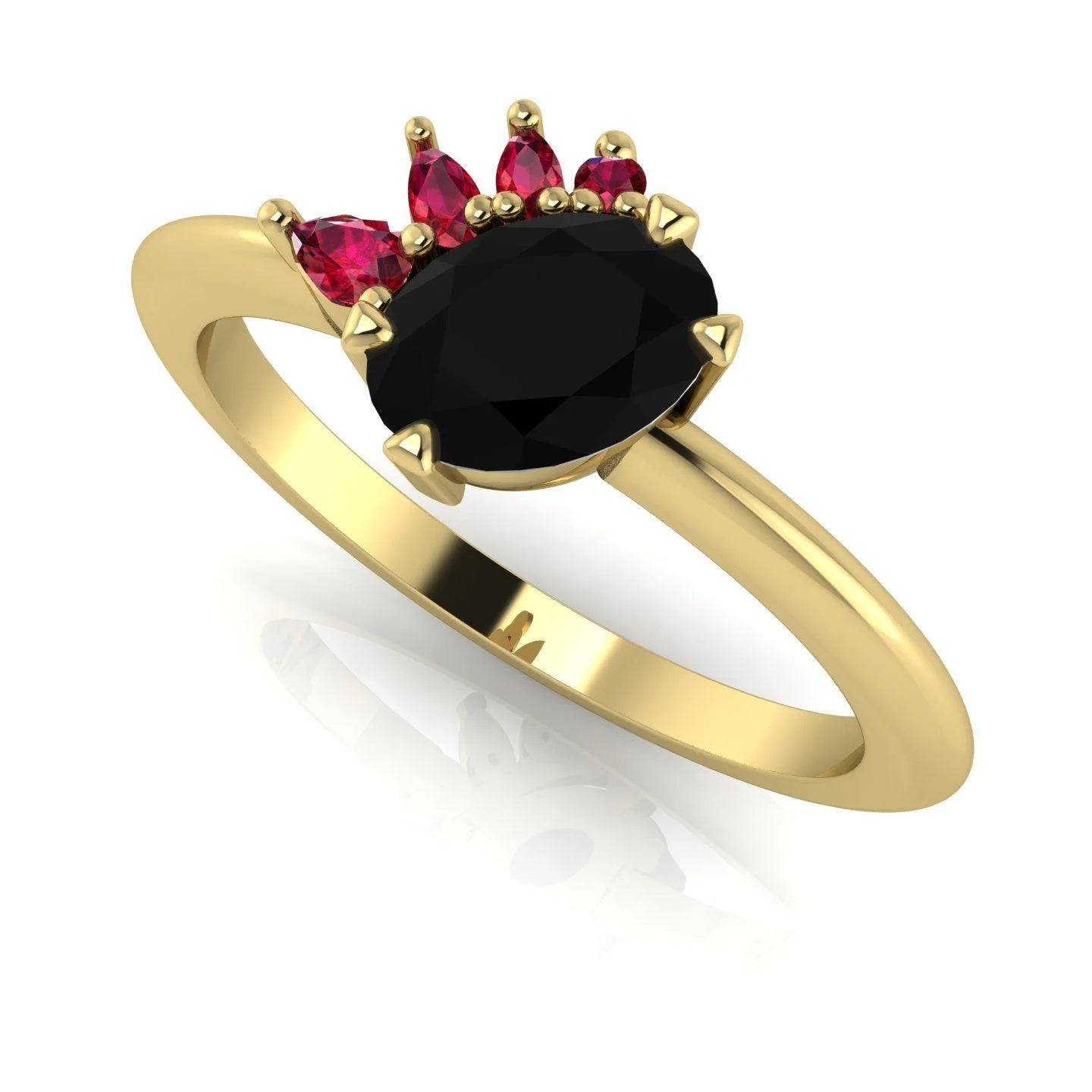 Selene black diamond and ruby engagement ring in 18ct yellow gold three-quarter view showing ruby crown cluster detail