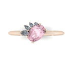 High angle studio detail shot of the Selene alternative engagement ring, showcasing the exceptional clarity and soft pink light reflections within the morganite and contrasting diamond facets.