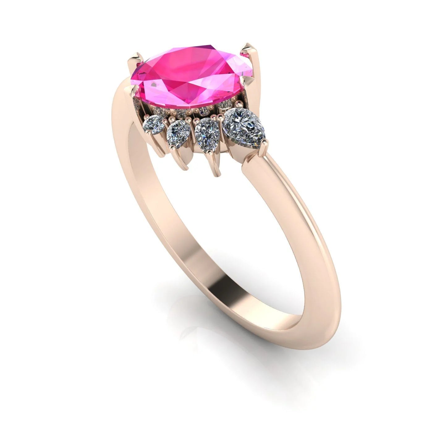 Front three-quarter studio view of the Selene pink sapphire ring, highlighting the unique crown-like arrangement of brilliant cluster diamonds against the rose gold setting.