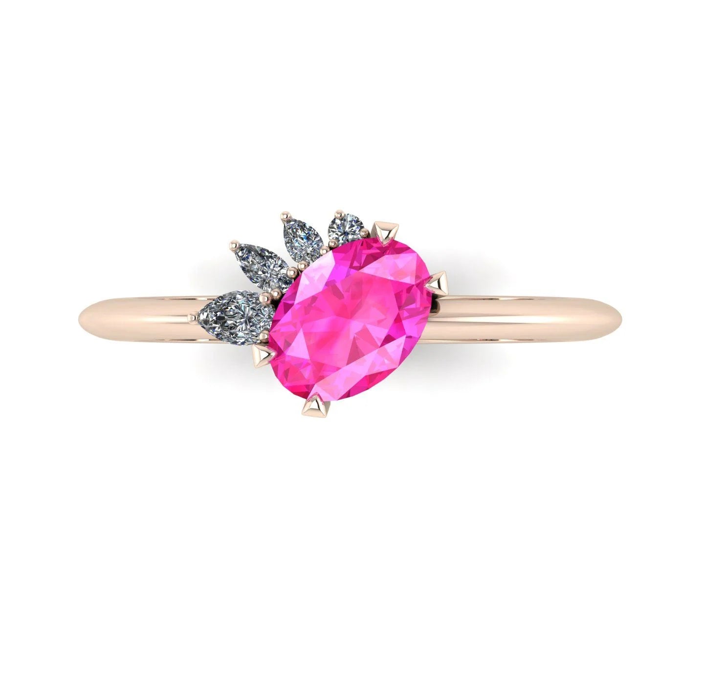 High angle studio detail shot of the Selene alternative engagement ring, showcasing the rich colour depth and light reflection across the pink sapphire and diamond facets.