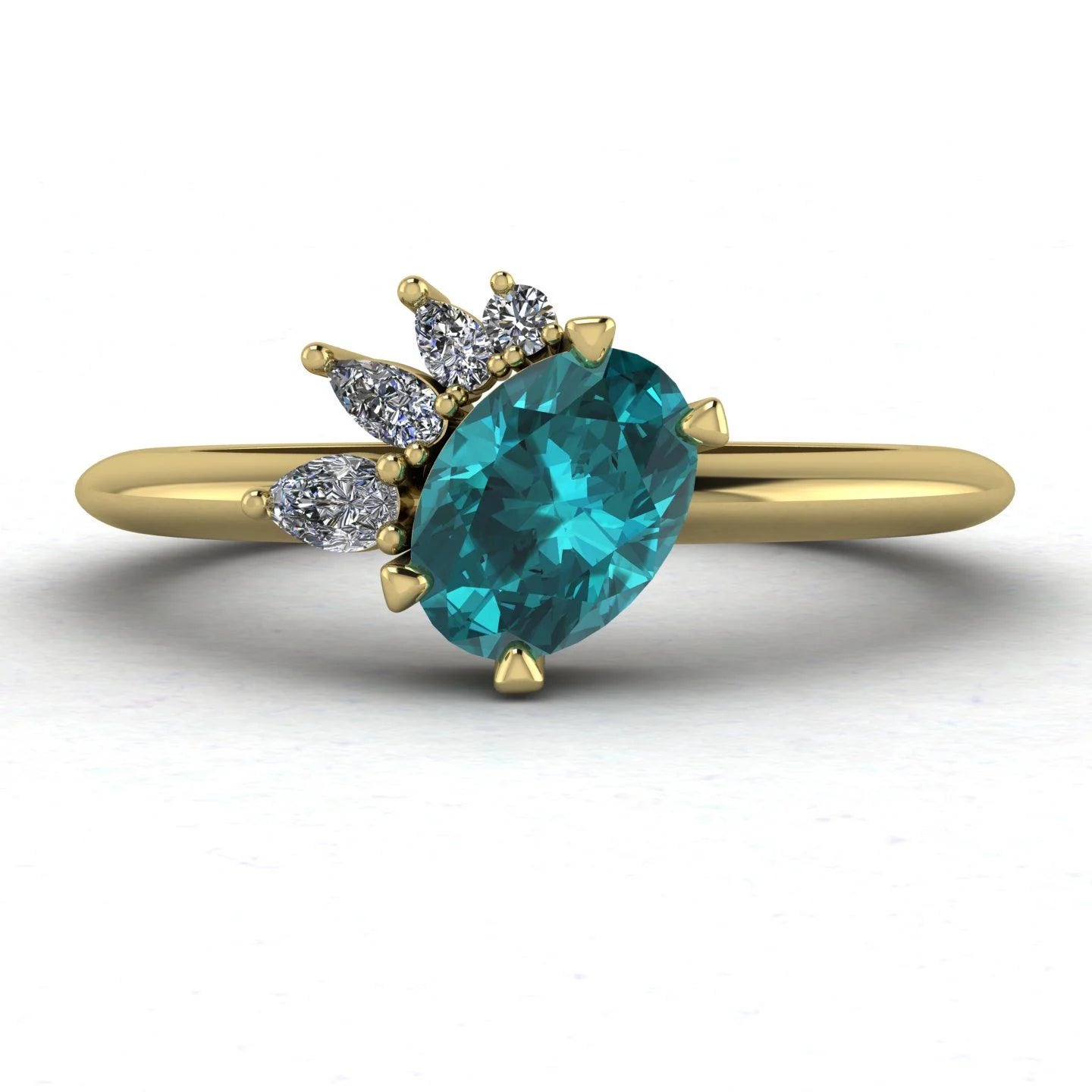 Selene oval teal sapphire and diamond engagement ring in 18ct yellow gold front view showing asymmetric pear and round diamond cluster