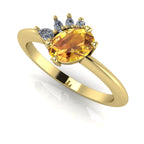 Front three-quarter studio view of the Selene yellow sapphire ring, highlighting the unique, organic layout of the brilliant cluster diamond settings.