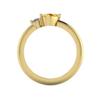 Through-finger view of the 18ct yellow gold cluster ring, showing the clean interior structure and the intricate under-gallery supporting the stones.