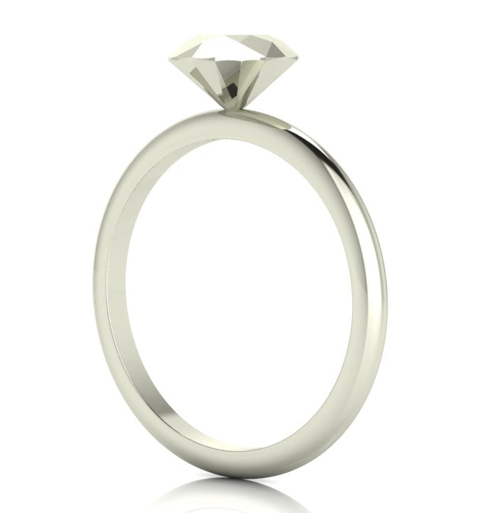 Angled perspective of a solid silver rock solitaire ring with geometric facets.