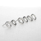 Front view of handmade 14mm sterling silver Vanilla earrings featuring a textured design.