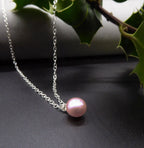 Single Pink Pearl Pendant On A Silver Chain
