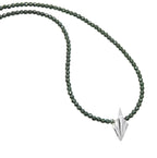 Small Art Deco sterling silver geometric pendant on full faceted hematite bead necklace, flatlay on white background