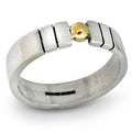 An angled perspective of the Solis Parallel ring, showcasing the contemporary open-front design and the contrast between the polished silver band and the gold orbs.