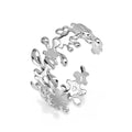 Side hero shot of the handmade sterling silver Splat cuff bracelet, featuring a wide fluid asymmetrical design.