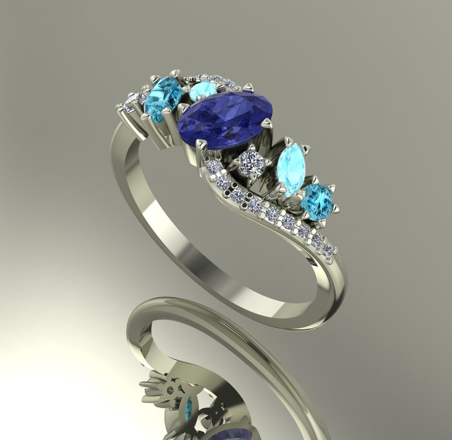 Angle profile showing the intricate wave setting in white gold with tanzanite and aquamarine gemstone cluster.
