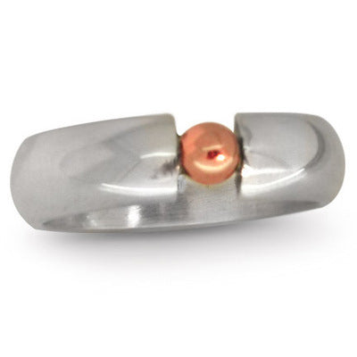 An angled perspective of The Solis Original ring, showcasing the sleek, contemporary profile and the subtle contrast between the silver and rose gold elements.