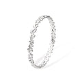 Side view of the thin silver Splash bangle highlighting the slender, organic shape and polished surface.