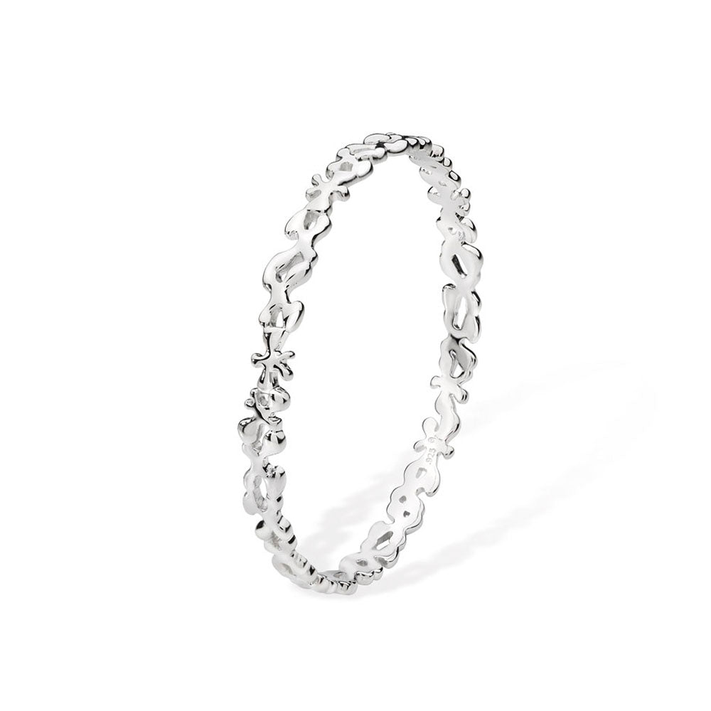 Side view of the thin silver Splash bangle highlighting the slender, organic shape and polished surface.