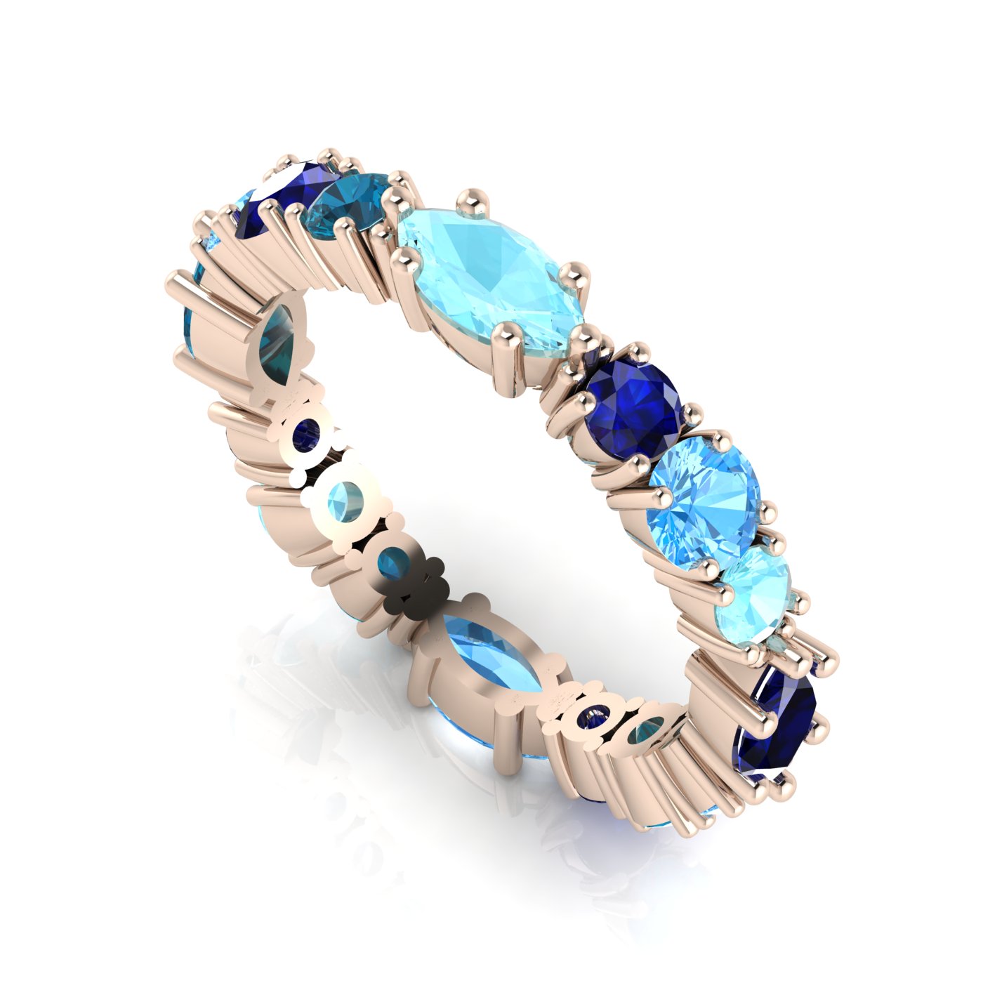 True Blue Allsorts eternity ring featuring natural blue sapphires and aquamarines in a 18ct rose gold band.