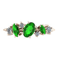 Front view of the Atlantis Paradise ring in 18ct rose gold featuring a vibrant green tsavorite garnet and a cluster of asymmetrical diamonds.