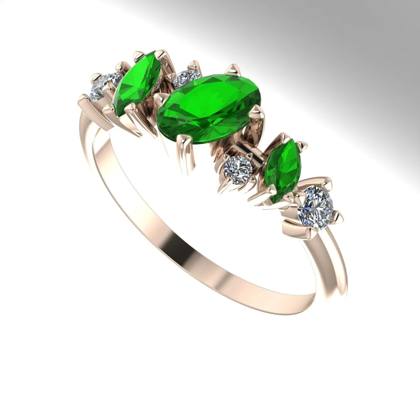 An angled view of the Atlantis Paradise cluster ring showcasing the sparkle of the diamonds and the rich green of the tsavorite garnet.
