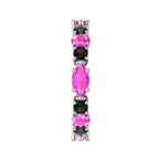 Top view of an unusual pink sapphire and black diamond eternity ring available in platinum
